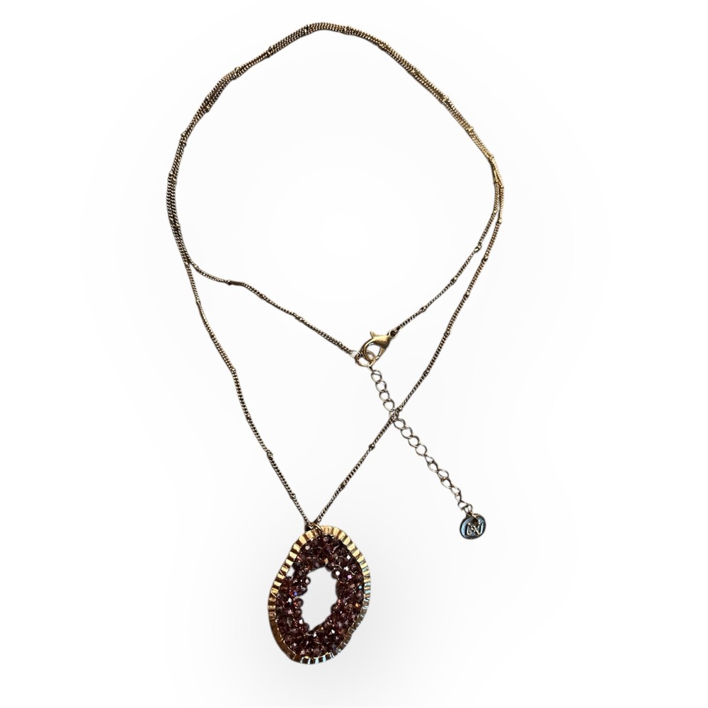 Gold tone necklace with purple faceted bead Pendant